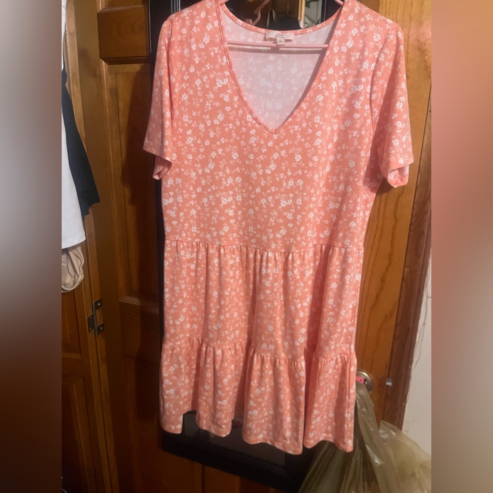 Simple pink dress with a white flower print